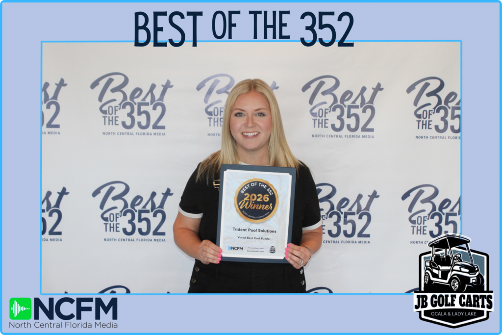 Holly Hughes With Trident Pool Solutions Holding Gold For Best Pool Builder In The Best Of The 352 Contest