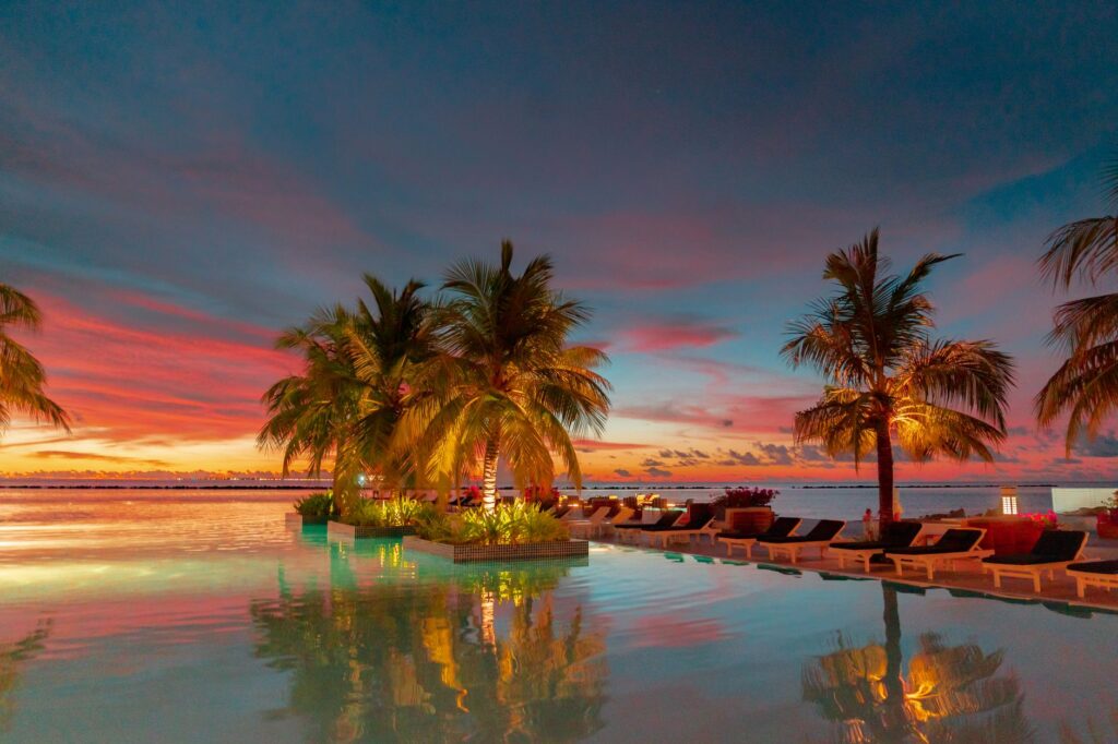 Choosing the Right LED Lighting Installers for Your Ocala Pool 2 Color-Changing Led Pool Light Glowing Blue In An Ocala Backyard Pool At Dusk