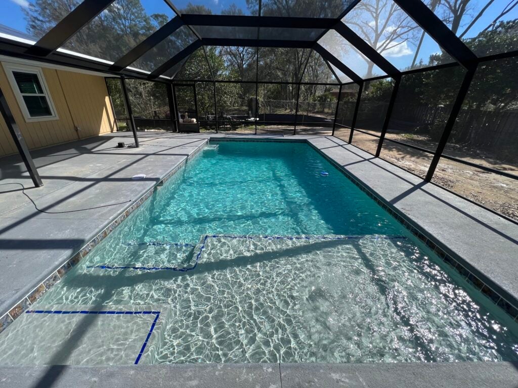 Green Pool No More: Algae Removal Pool Service for Ocala & The Villages 2 Clear Turquoise Pool Water After Algae Removal Pool Service In The Villages Backyard